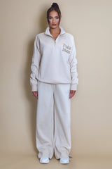 Tres Bien Half Zip Relaxed Fit Sweatshirt In Beige
